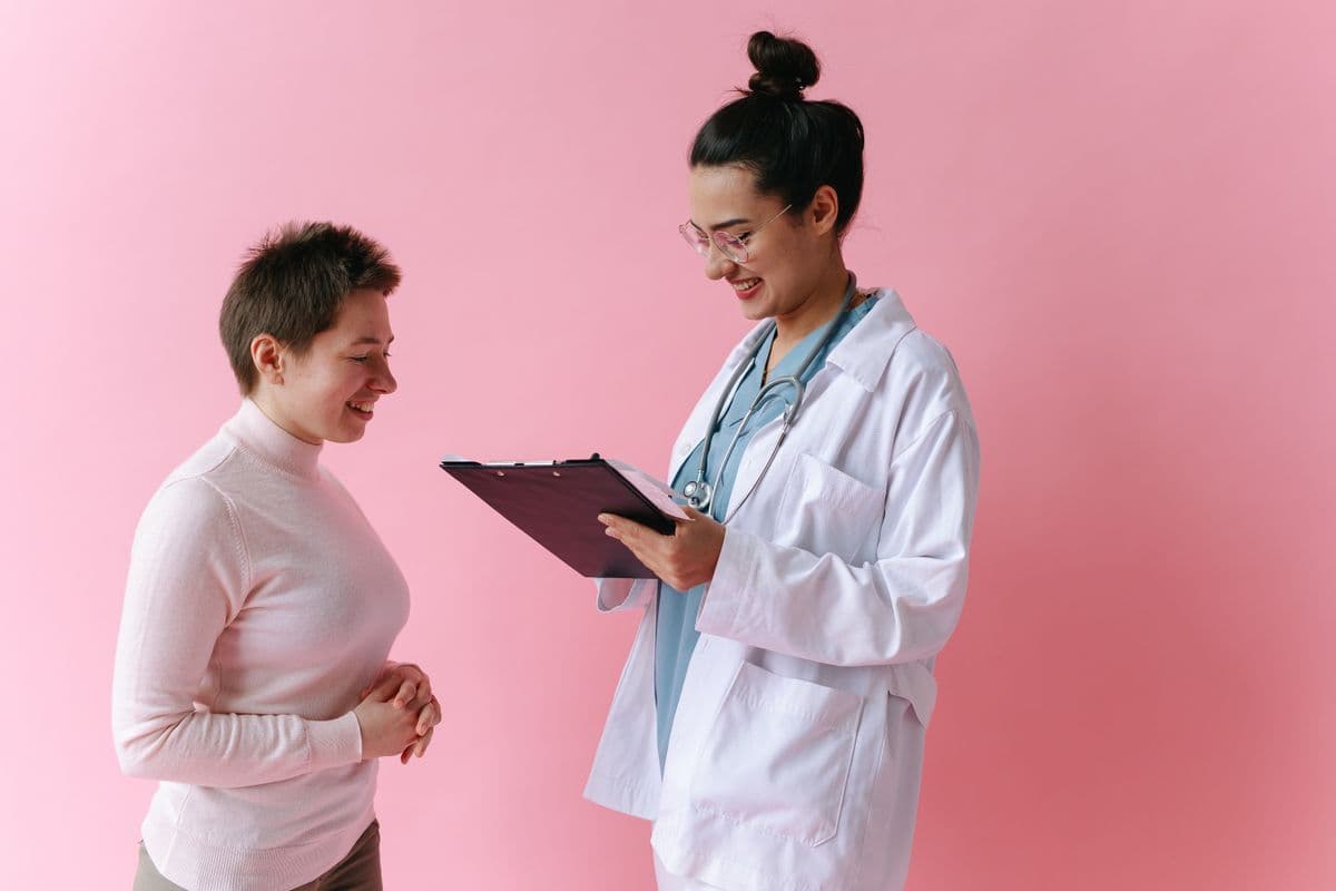A smiling patient at a friendly consultation